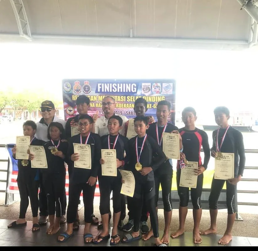 Swimming Across the Dinding Strait Makes History
